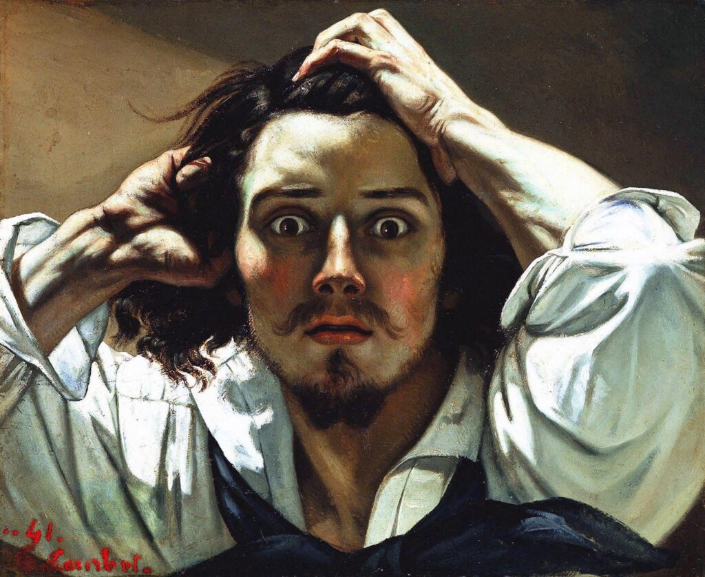 A man with tousled dark hair grips his head in apparent shock or distress, eyes wide and staring, wearing a white shirt and black vest—an evocative scene often found in dramatic portraits, set against a dark background.