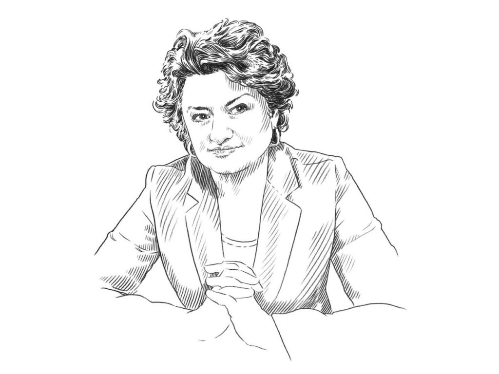 A black-and-white sketch of a person with short curly hair in a blazer, sitting with hands clasped and looking forward. Detailed fine lines for shading lend this Art for Tomorrow piece its striking realism.