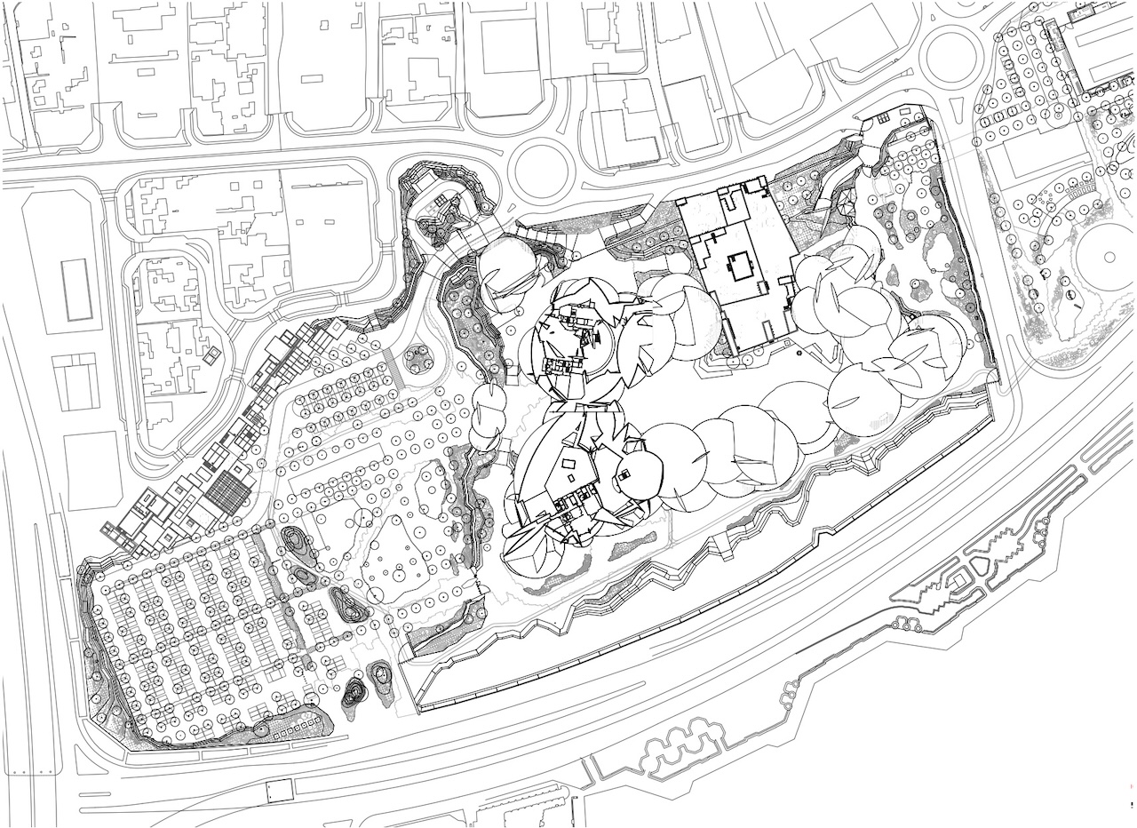 Black and white architectural site plan showing buildings, trees, pathways, parking areas, and surrounding streets, with detailed landscaping and various structures distributed across the plot